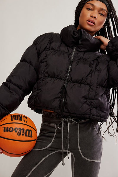 in a bubble puffer jacket