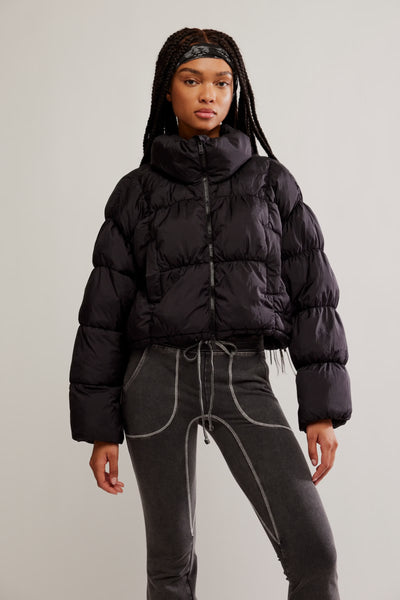 in a bubble puffer jacket