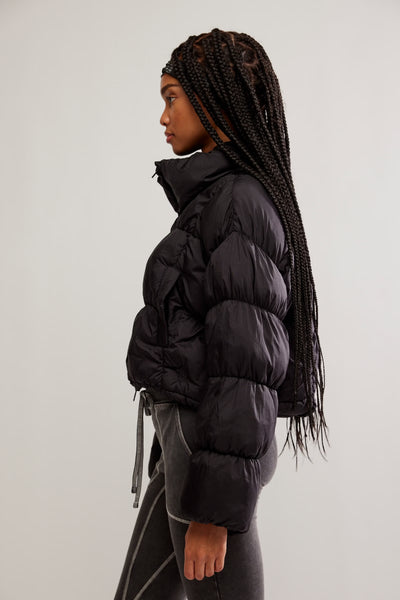 in a bubble puffer jacket