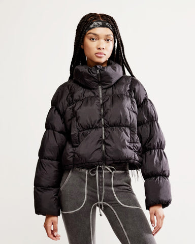 in a bubble puffer jacket