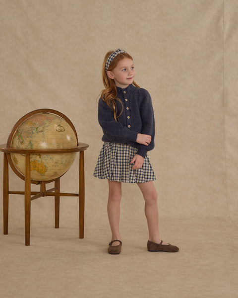 pleated mini skirt