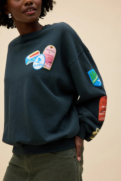 ski patch & pass collector sweatshirt