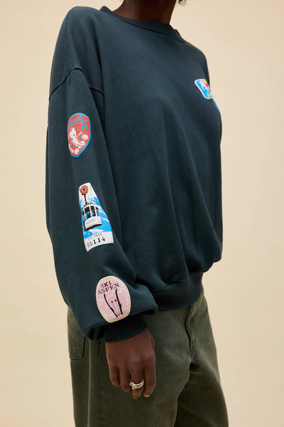 ski patch & pass collector sweatshirt